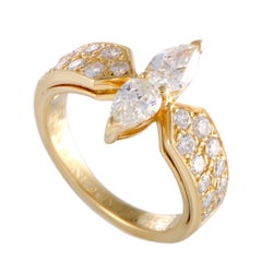 Van Cleef & Arpels 18 Karat Yellow Gold Two Pear Diamonds and Side Diamonds Ring