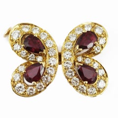 Van Cleef & Arpels 18ct gold diamond and ruby set Necklace, Earrings and Brooch