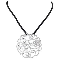 Van Cleef
Arpels 18K Diamond Pendant On A Silk Cord "Dentelle"