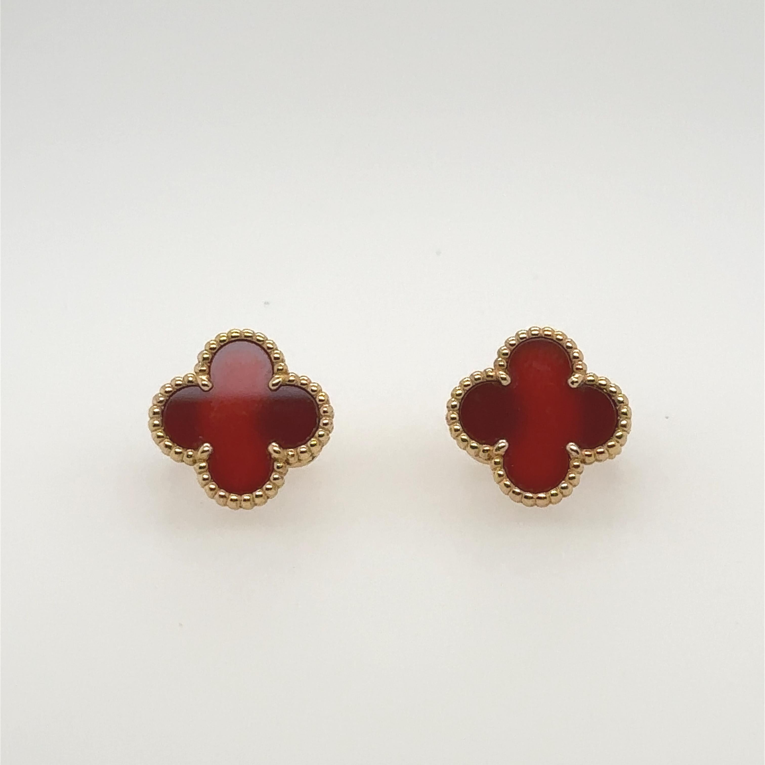Van Cleef & Arpels  Alhambra Earrings
18k yellow gold inlaid with carnelian.
Stamped 750