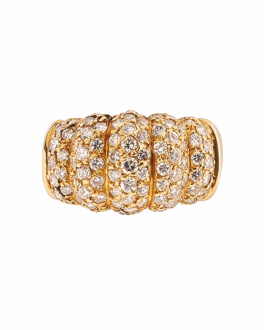This 18K Gold and Diamond ring is set with approximately 0.90 carats of full cut diamonds. Size 6.25. Numbered, makers mark and export stamp, signed. 