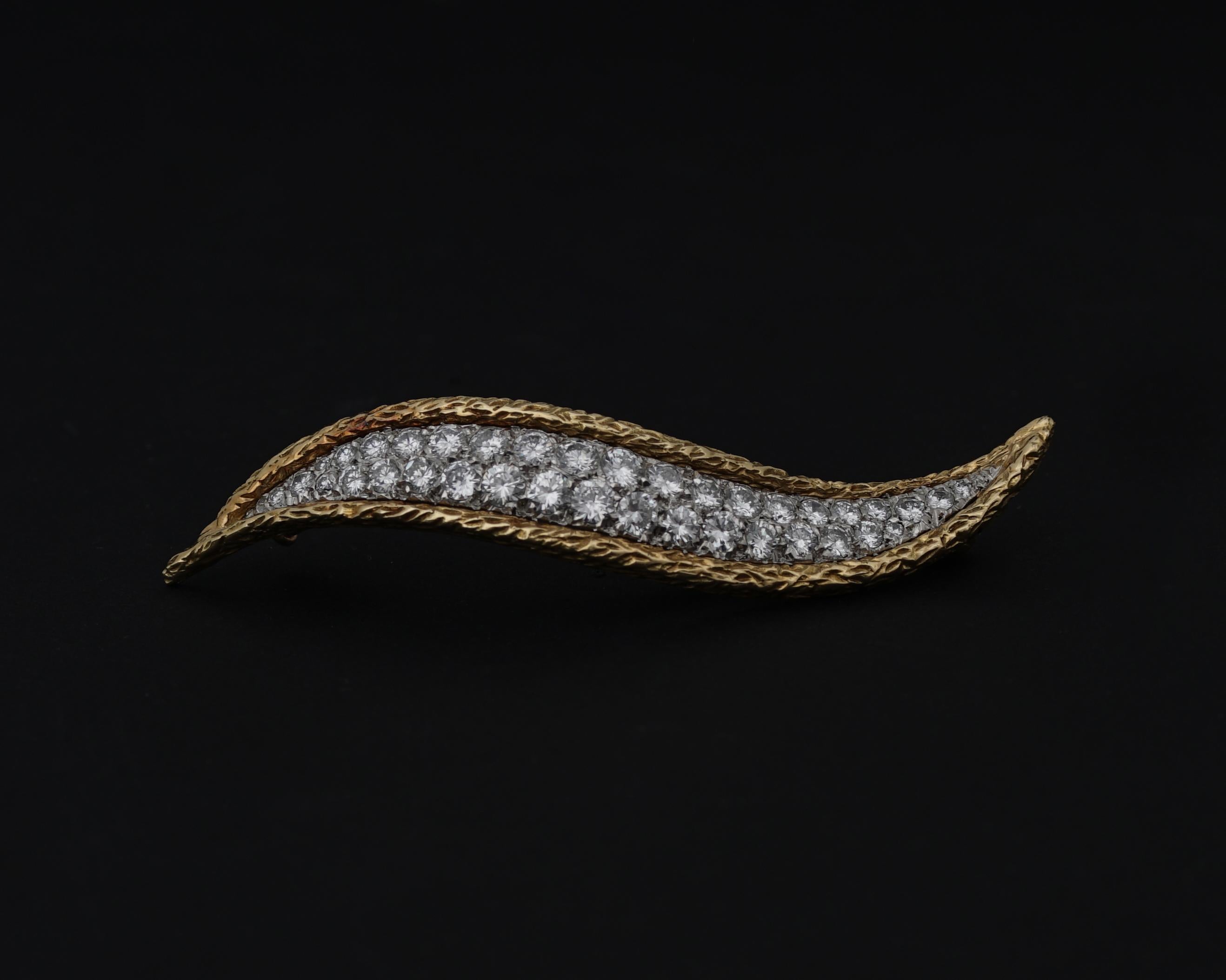 Important Van Cleef & Arpels, 18k Gold and Diamonds Flame Brooch, 1967
Of stylized flame design, set with 37 round brilliant-cut diamond for a total of 1,90 cts.
Signed and Numbered

Brooch Dimension
5.8cm L x 1.7cm W.

The Flame design was