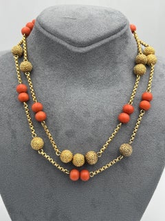 Van Cleef & Arpels 18k gold ball and coral bead necklace