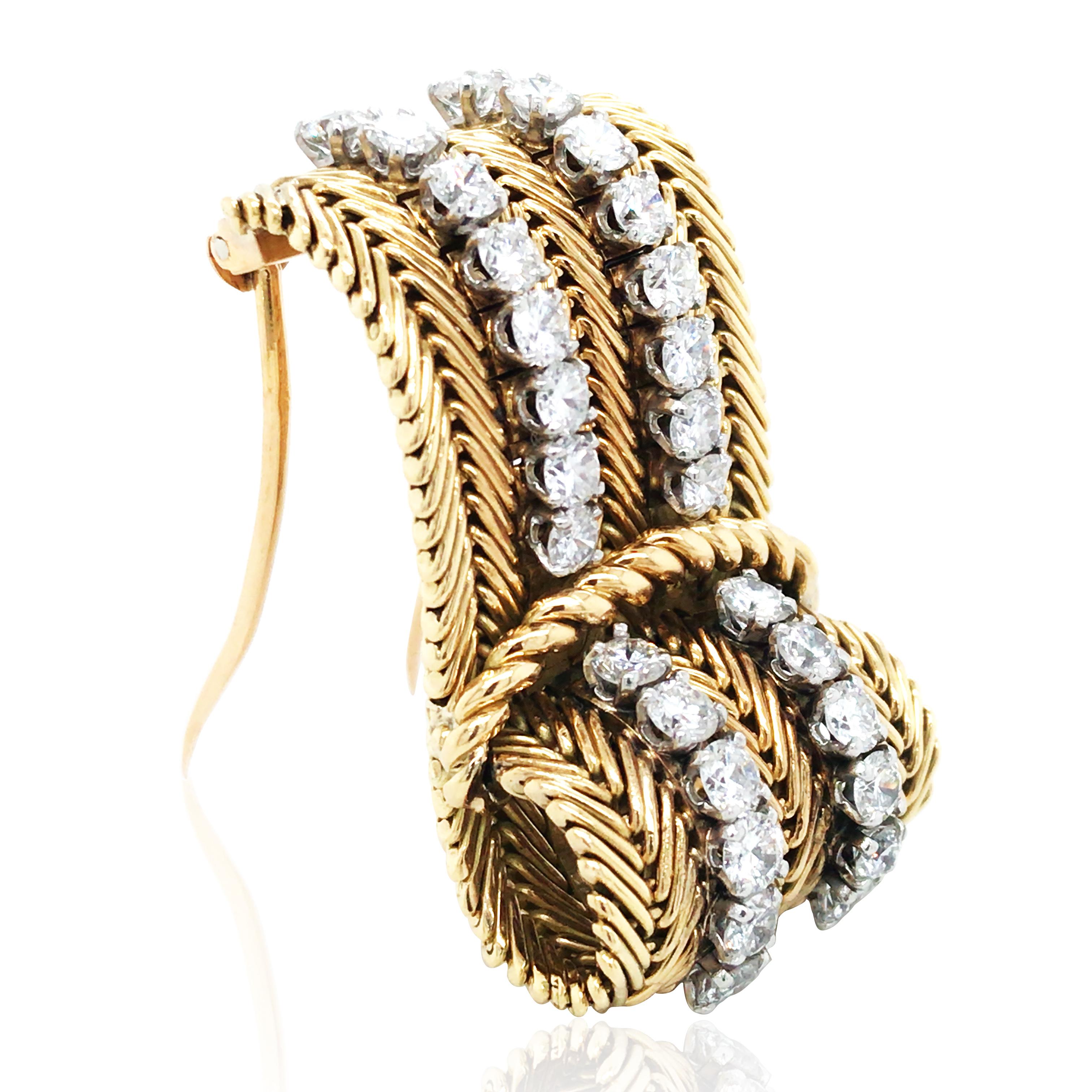 This Van Cleef & Arpels brooch exemplifies unparalleled craftsmanship, with a metal design that mimics the texture of fabric. Sparkling diamonds are set delicately, adding a touch of luxury and elegance. Every detail is meticulously crafted,