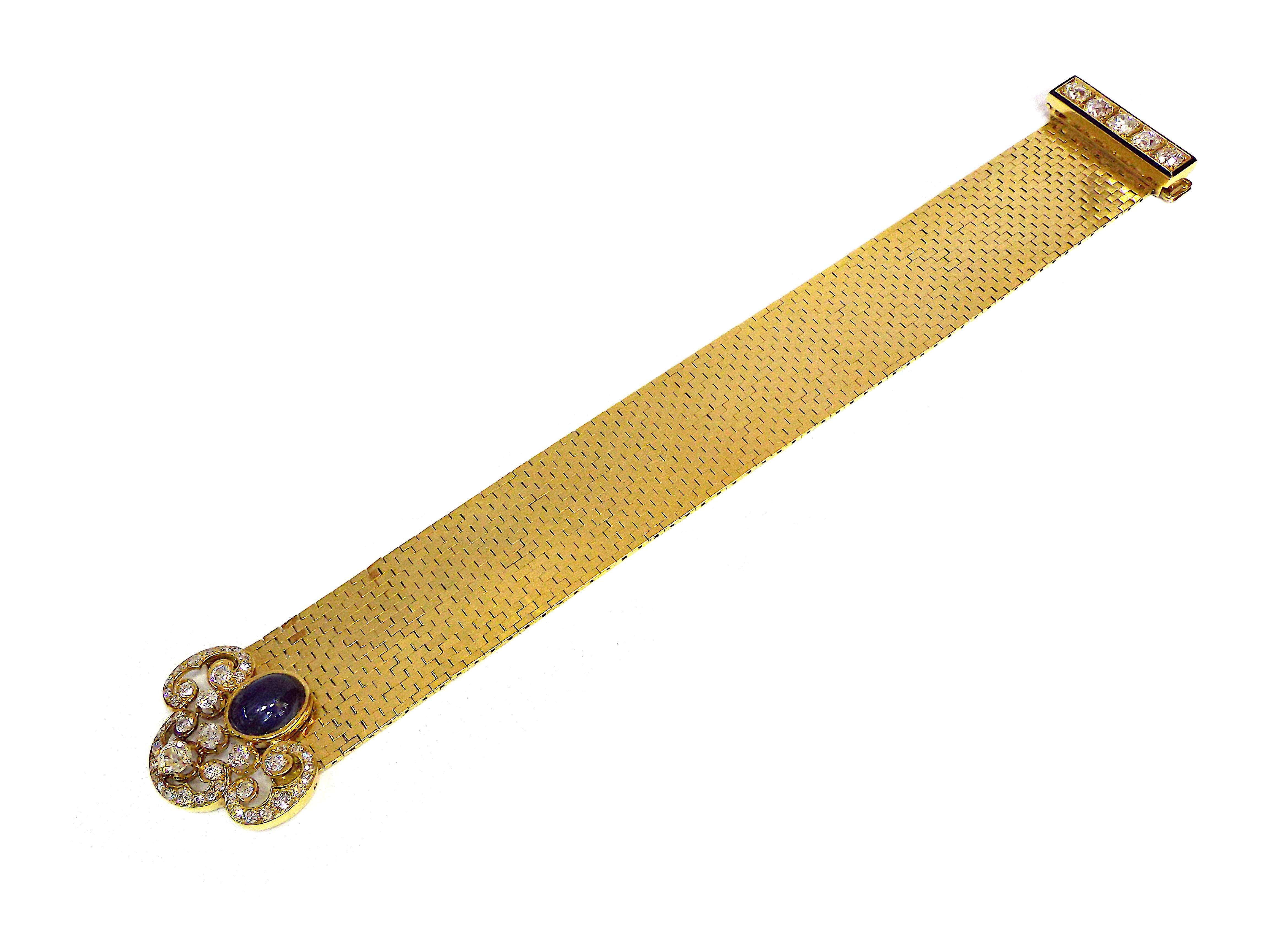 A fabulous wide bracelet by Van Cleef and Arpels from Ludo collection. Featuring mine, European, and single-cut diamonds weighing a total of approximately 4.15 carats; sapphire cabochon, enamel, 18k gold. Marked Van Cleef & Arpels, French hallmarks,