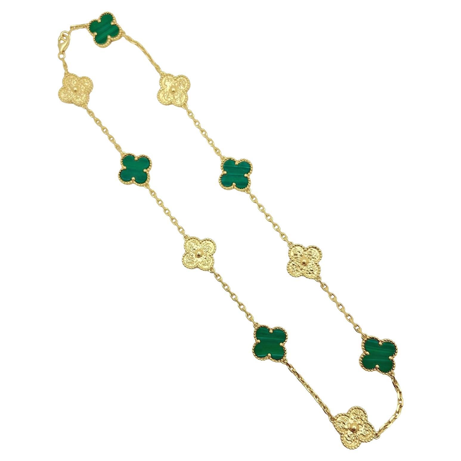 Van Cleef & Arpels Vintage Alhambra Necklace, featuring five clover-shaped motifs of polished malachite in gold beaded frames alternating with five clover-shaped motifs in solid gold- linked by sections of gold chain in between. Lobster-style clasp.