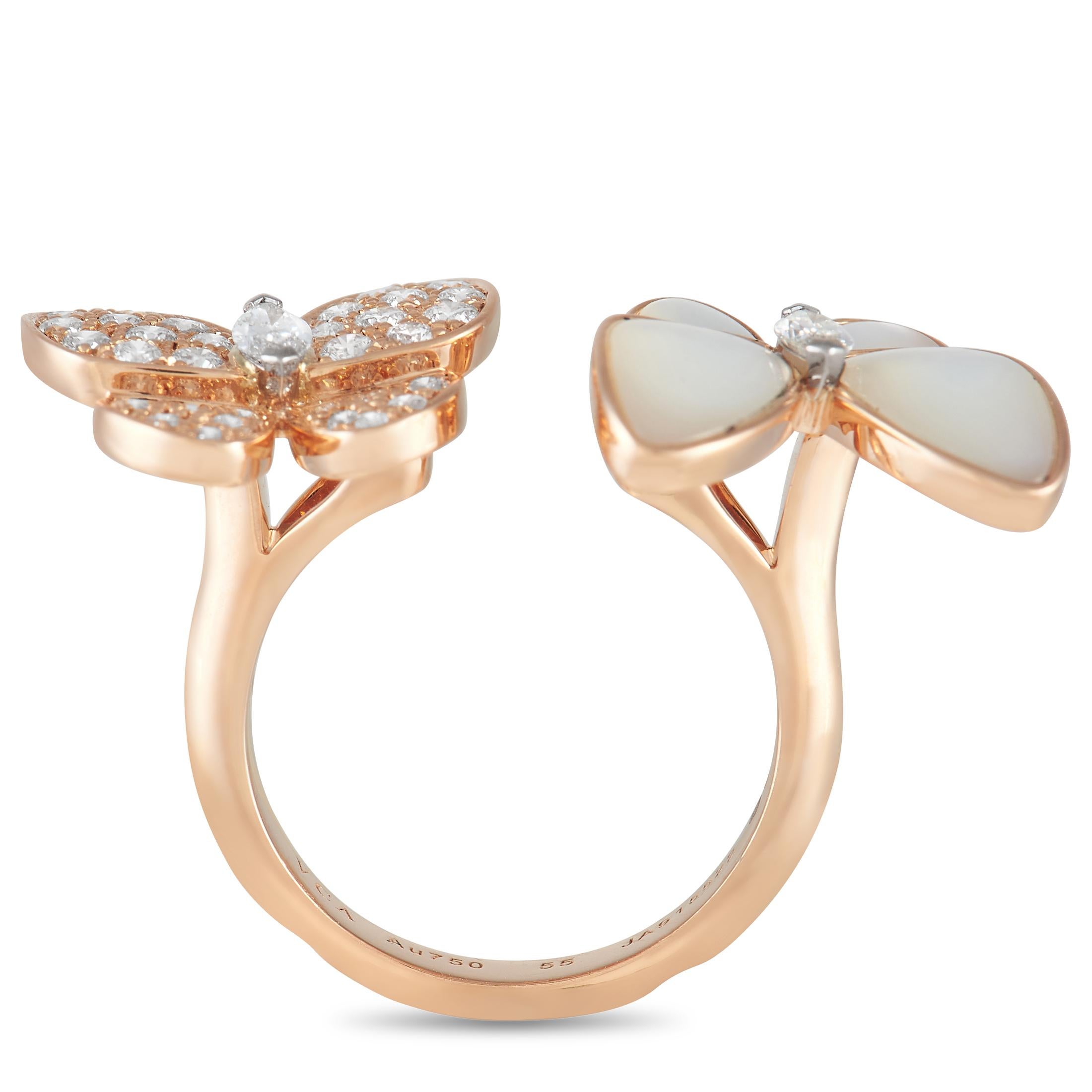 A stylish, asymmetrical design gives this Van Cleef & Arpels butterfly ring a delightful sense of movement. Crafted to look like two butterflies in flight, this charming piece includes a unique between-the-finger design for added visual impact.