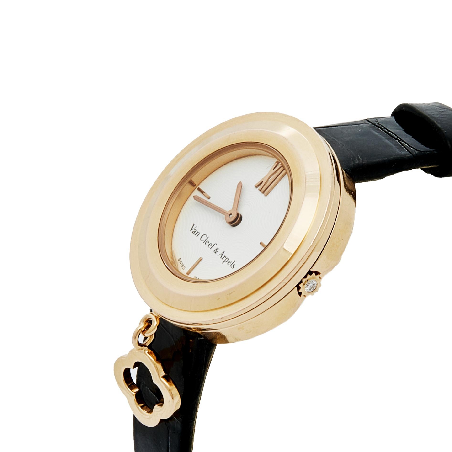 Elevate your style quotient with this exquisite Van Cleef & Arpels wristwatch. Featuring a white dial with gold hands and an 18k rose gold case, this timepiece is the epitome of elegance. Powered by a quartz movement, this stunning watch will nail