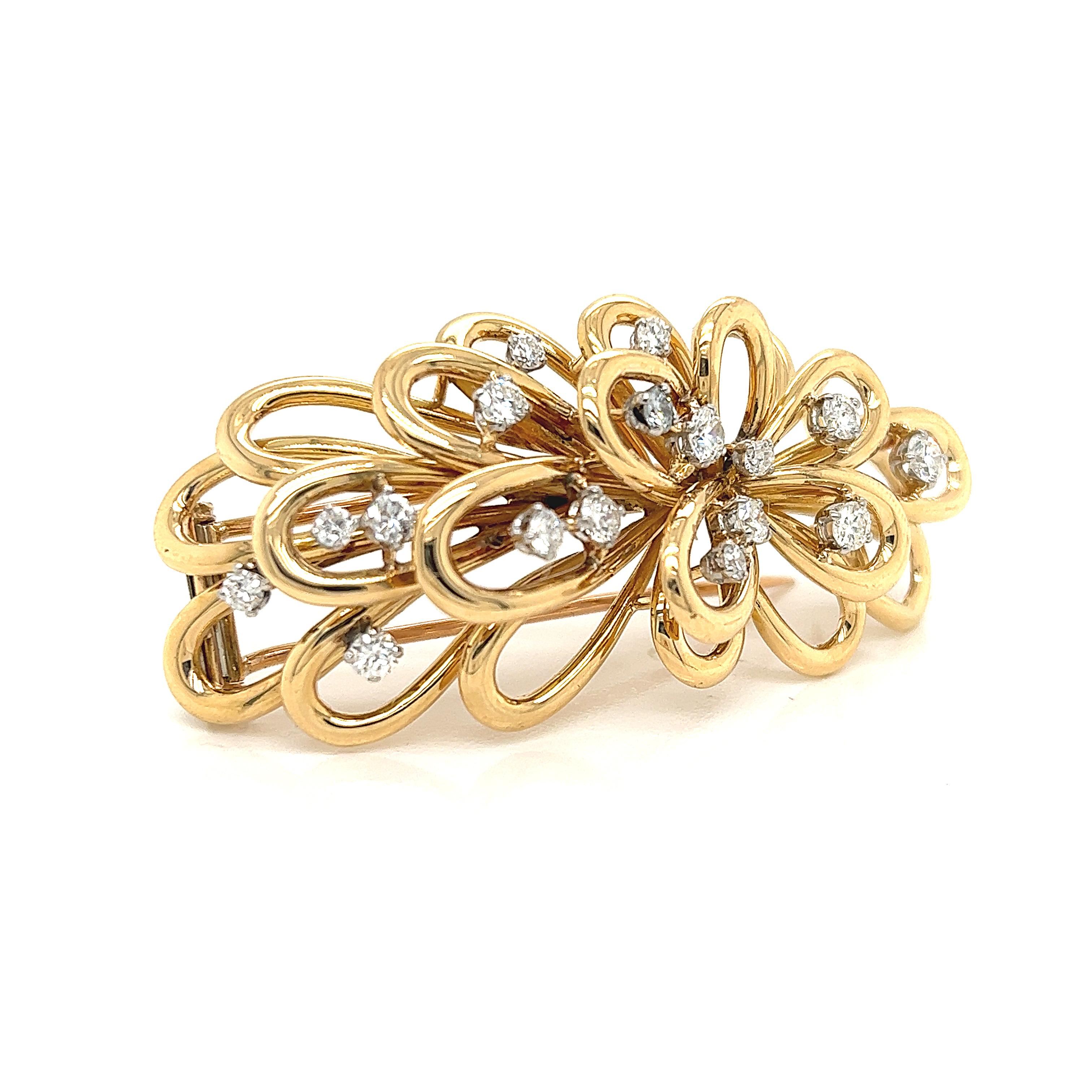 Beautiful craftsman ship shown on this one of a kind piece from Van Cleef & Arpels.  This unique hair clip brooch is crafted in 18k yellow gold adorned with natural round brilliant cut diamonds ranging in sizes from 0.5 - 0.20 ct. throughout the