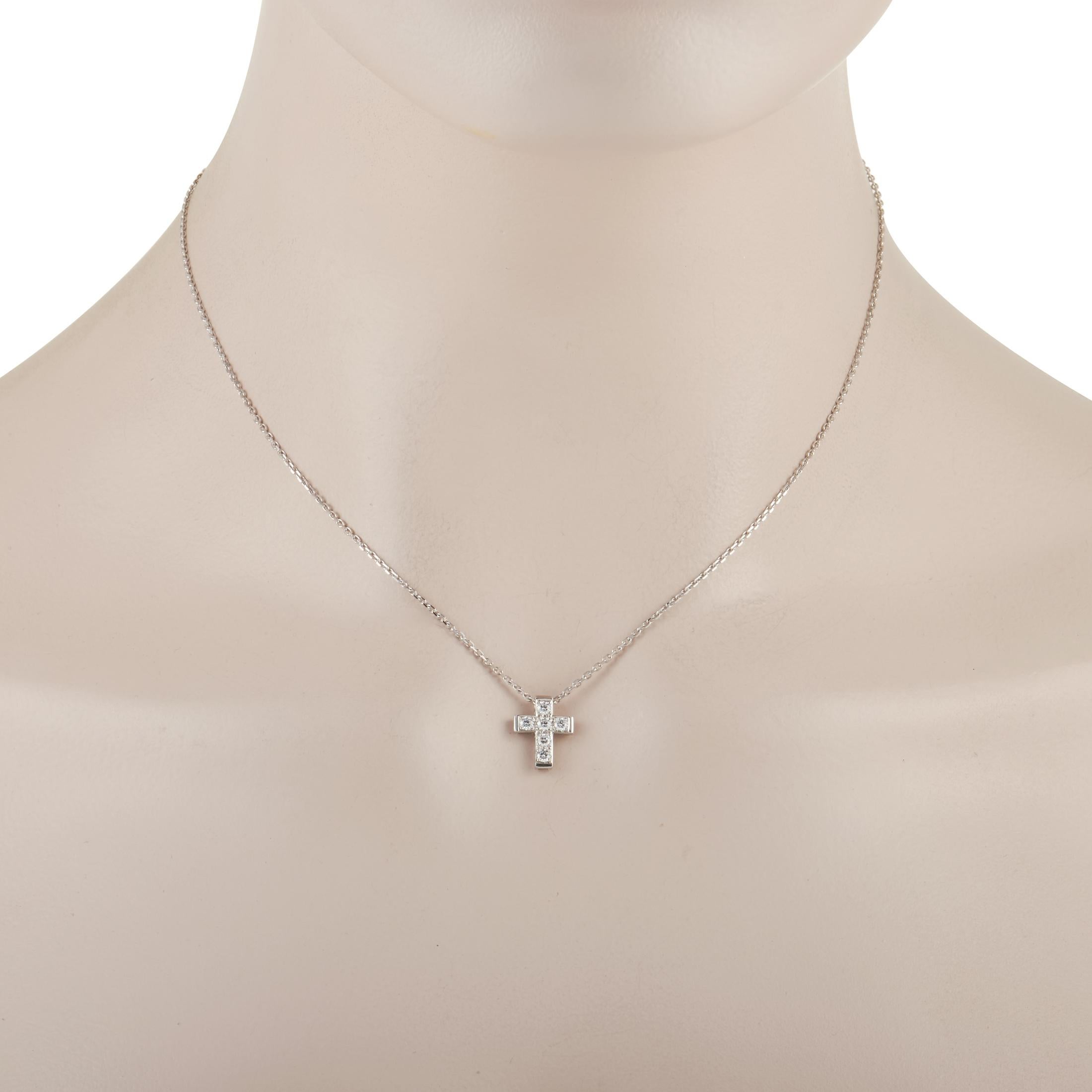 This dainty design is perfect for anyone who wants to put their faith on display. Crafted from 18K White Gold, this luxury piece features a charming cross pendant that is covered in a series of six diamonds with E color and VVS clarity. Together,