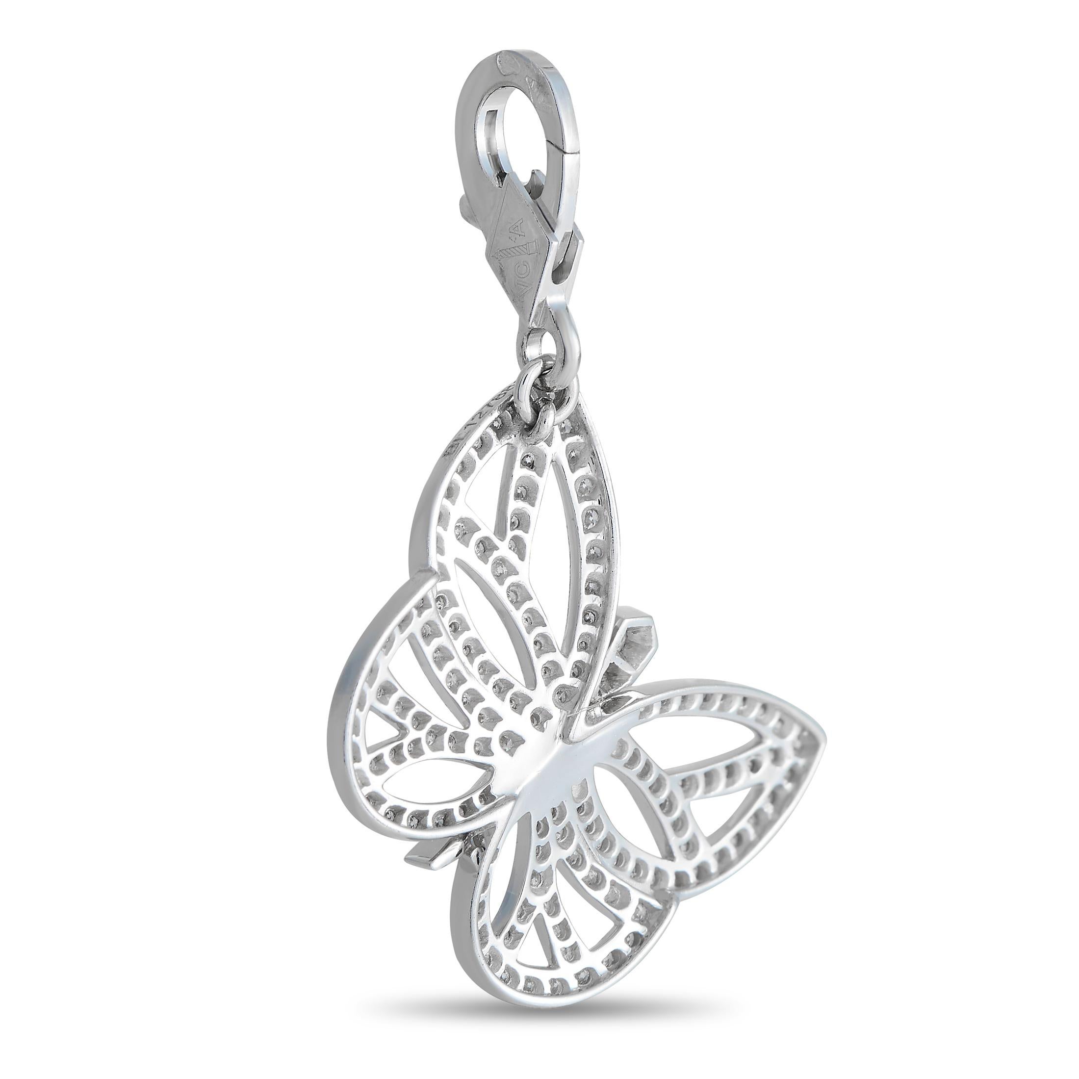 Let this diamond-studded butterfly charm from Van Cleef & Arpels bring a flutter of beauty and sparkle to your day. The charm is crafted in 18K white gold and features a butterfly outline traced by round brilliant diamonds. The butterfly charm is