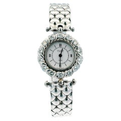 Van Cleef & Arpels Montre pour femme en or blanc 18 carats avec lunette en diamants