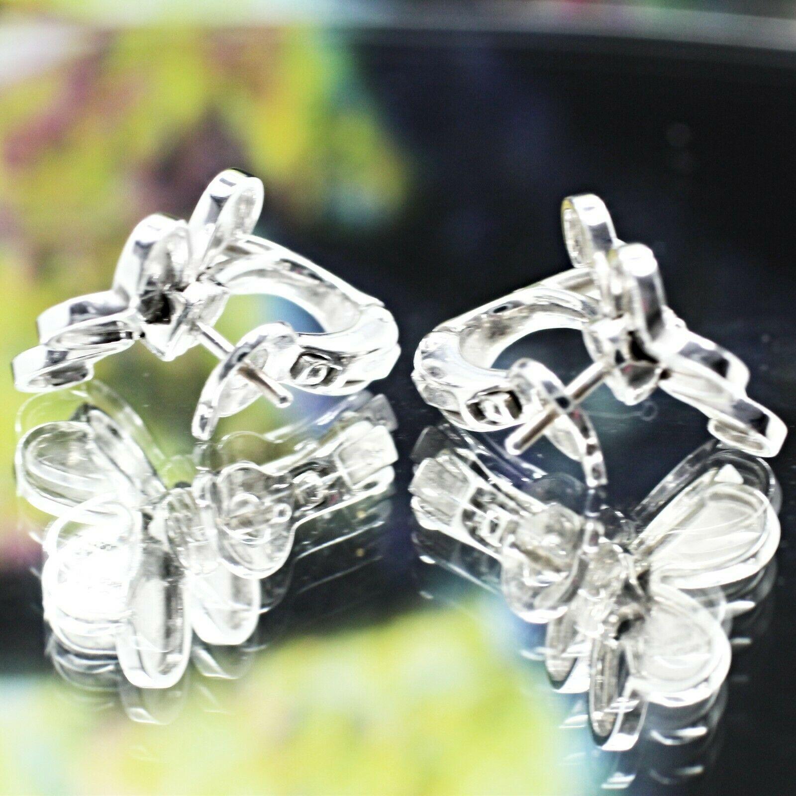 Van Cleef & Arpels 18 Karat White Gold Diamond Flower Earrings In Excellent Condition In Los Angeles, CA