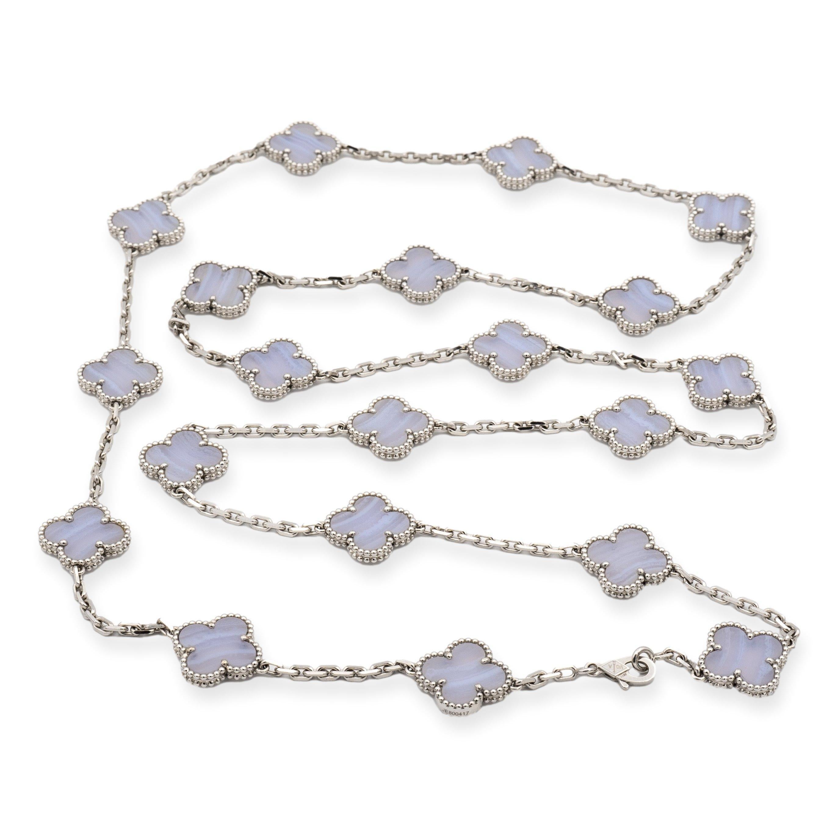 Van Cleef & Arpels necklace from the Vintage Alhambra collection, meticulously crafted in 18 karat white gold featuring 20 chalcedony stones elegantly encased within the iconic clover motifs. The necklace extends to a length of 33.8 inches, with