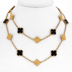 Van Cleef & Arpels 18K Yellow 20 Motif Onyx And Gold Alhambra Vintage Necklace
