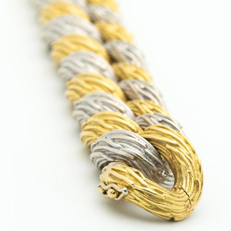 Van Cleef & Arpels 18 Karat Yellow and White Gold Curblink Bracelet, circa 1960s In Excellent Condition In New York, NY