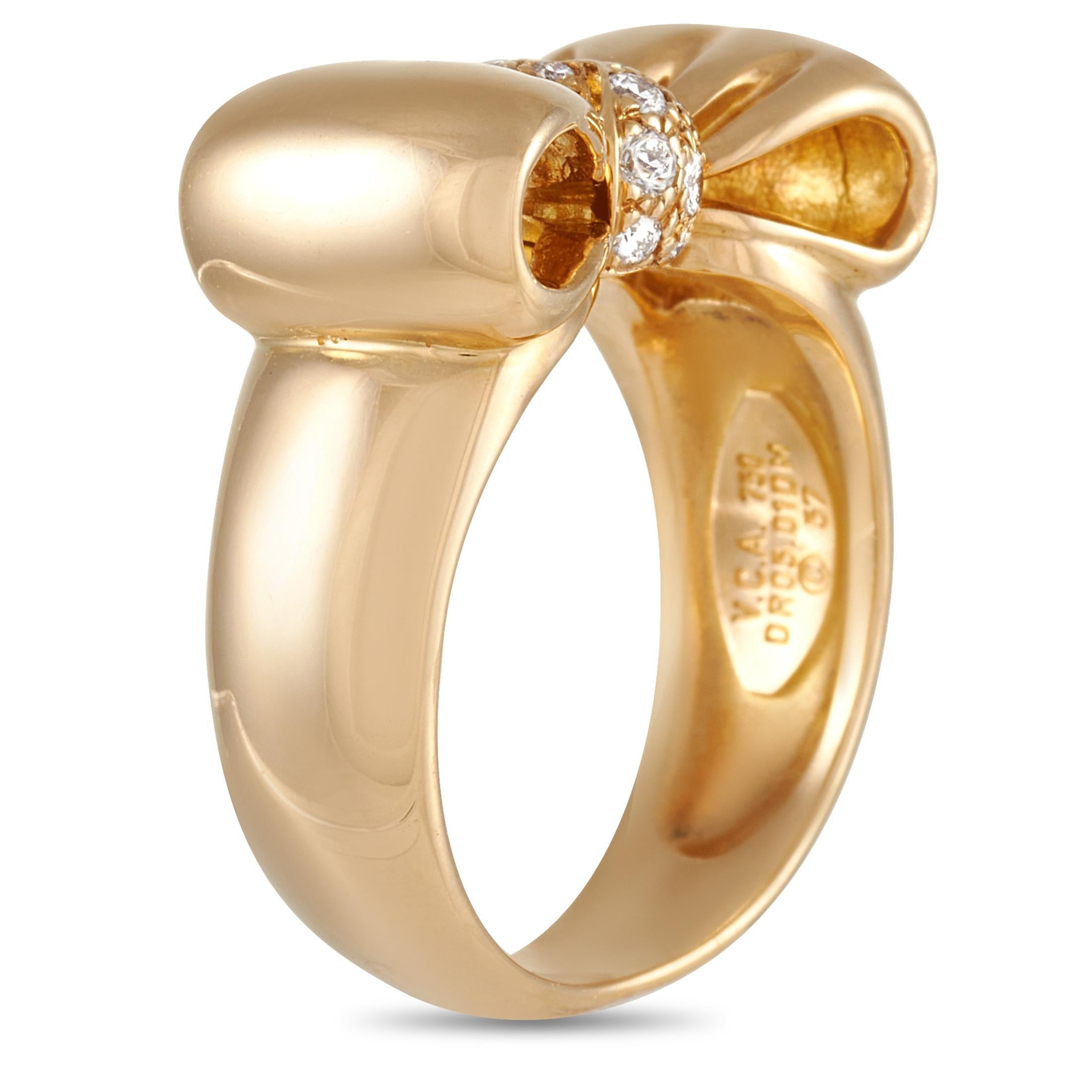 This Van Cleef & Arpels 18K Yellow Gold 0.20 ct Diamond Bow Ring is a cute statement piece, shaped to look like a ribbon and set with 0.20 carats of round diamonds. The ring has a band thickness of 7 mm, a top height of 6 mm, and top dimensions of