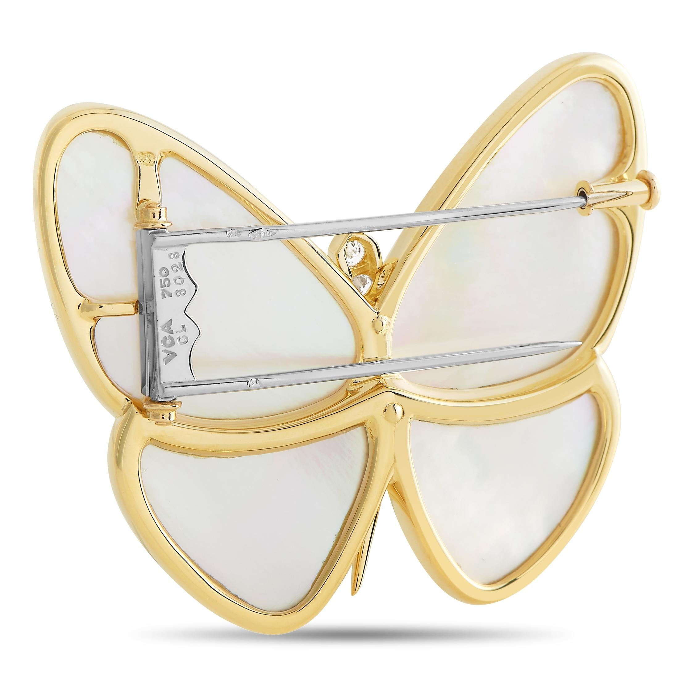 This charming Van Cleef & Arpels brooch is made with 18K yellow gold and forms a beautiful butterfly. The body of the butterfly is set with a 0.23 carat curved row of diamonds, while each segment of its wings is inlaid with a soft white mother of