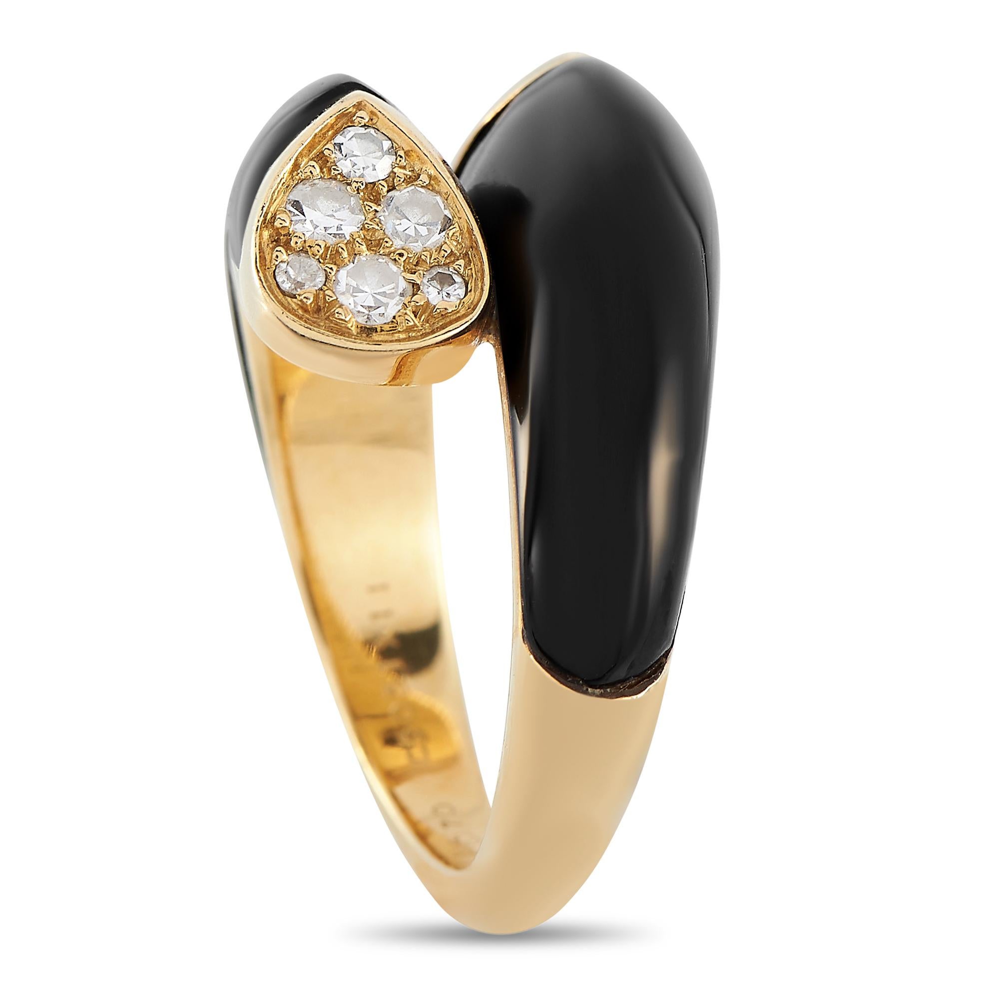 Add a hint of vintage glam to any outfit with this Van Cleef & Arpels ring. It features a bypass shank in ritzy 18K yellow gold with cross-over shoulders detailed with an inlay of jet-black onyx. Providing sparkle to the ring are brilliant diamonds