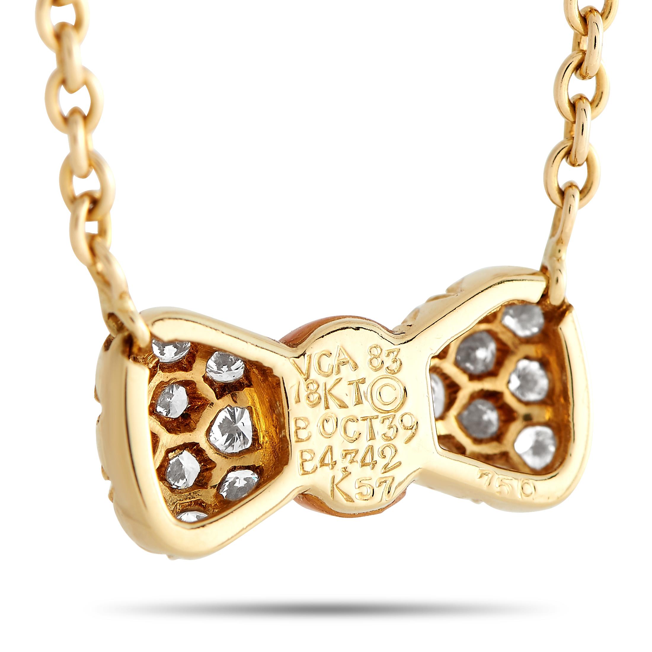 A dainty diamond jewelry for those who seek to add a hint of luxury, a touch of color, and a dash of feminity to their looks. This Van Cleef & Arpels creation features a 15 yellow gold chain holding a 0.37 by 0.75 bow-shaped pendant detailed with a