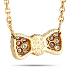 Van Cleef & Arpels 18K Yellow Gold 0.39ct Diamond and Coral Bow Necklace