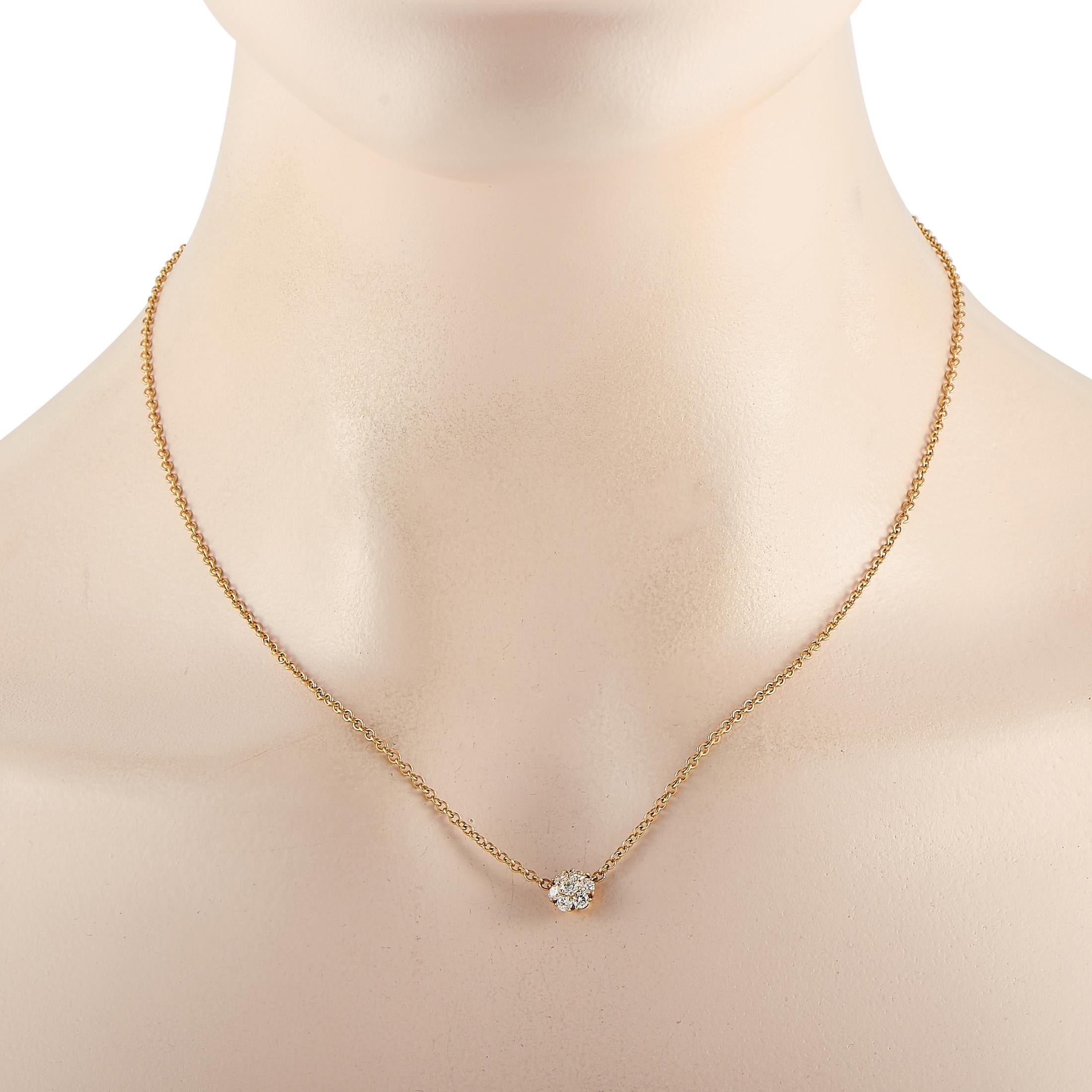 This Van Cleef & Arpels necklace is made of 18K yellow gold and embellished with diamonds that amount to 0.50 carats. The diamonds feature E color and VVS clarity. The necklace weighs 4.7 grams and boasts an 18” chain and a pendant that measures