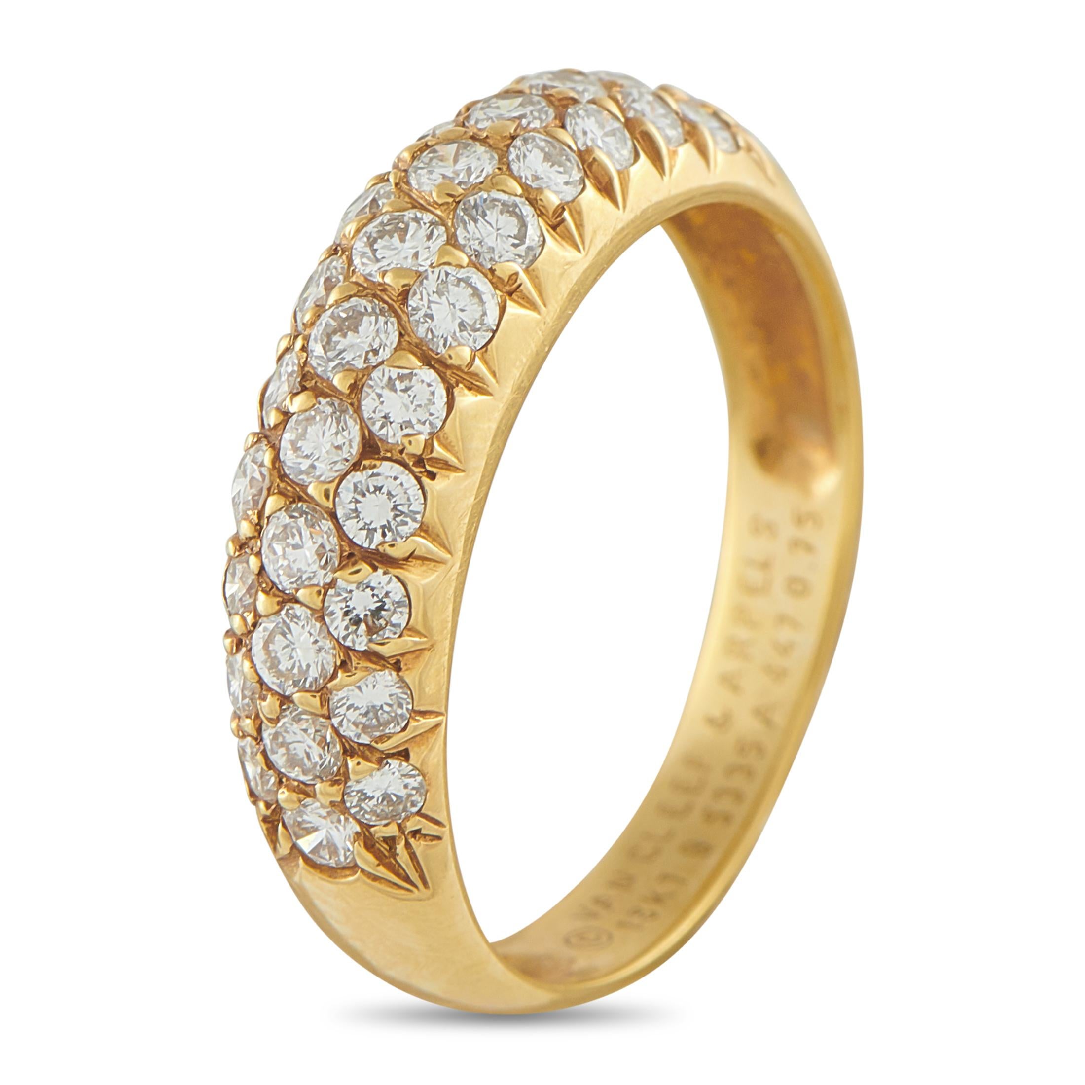 A timeless piece of Parisian elegance. This Van Cleef & Arpels ring features a yellow gold band with a gently sloping semidome profile. Its entire top surface is illuminated by 0.75 carats of brilliant round diamonds, meticulously arranged across