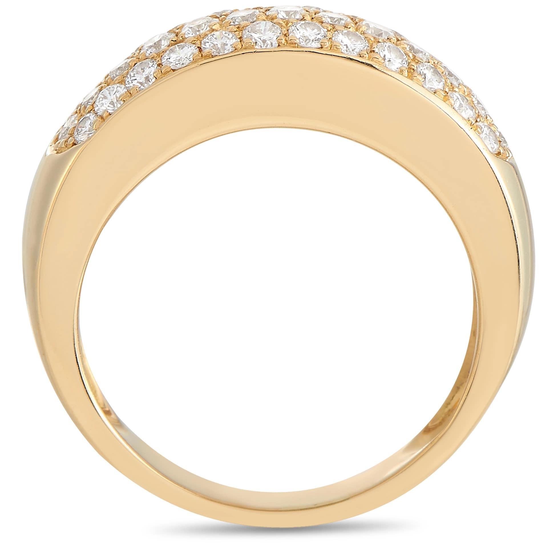 Sleek and simple, this exquisite Van Cleef & Arpels ring will become an instant classic. A smooth setting crafted from 18K yellow gold contrasts beautifully against three rows of shimmering diamonds with E color and VVS clarity, which together total