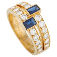 Van Cleef 
Arpels 18K Yellow Gold 1.00 Ct Diamond and Sapphire Ring