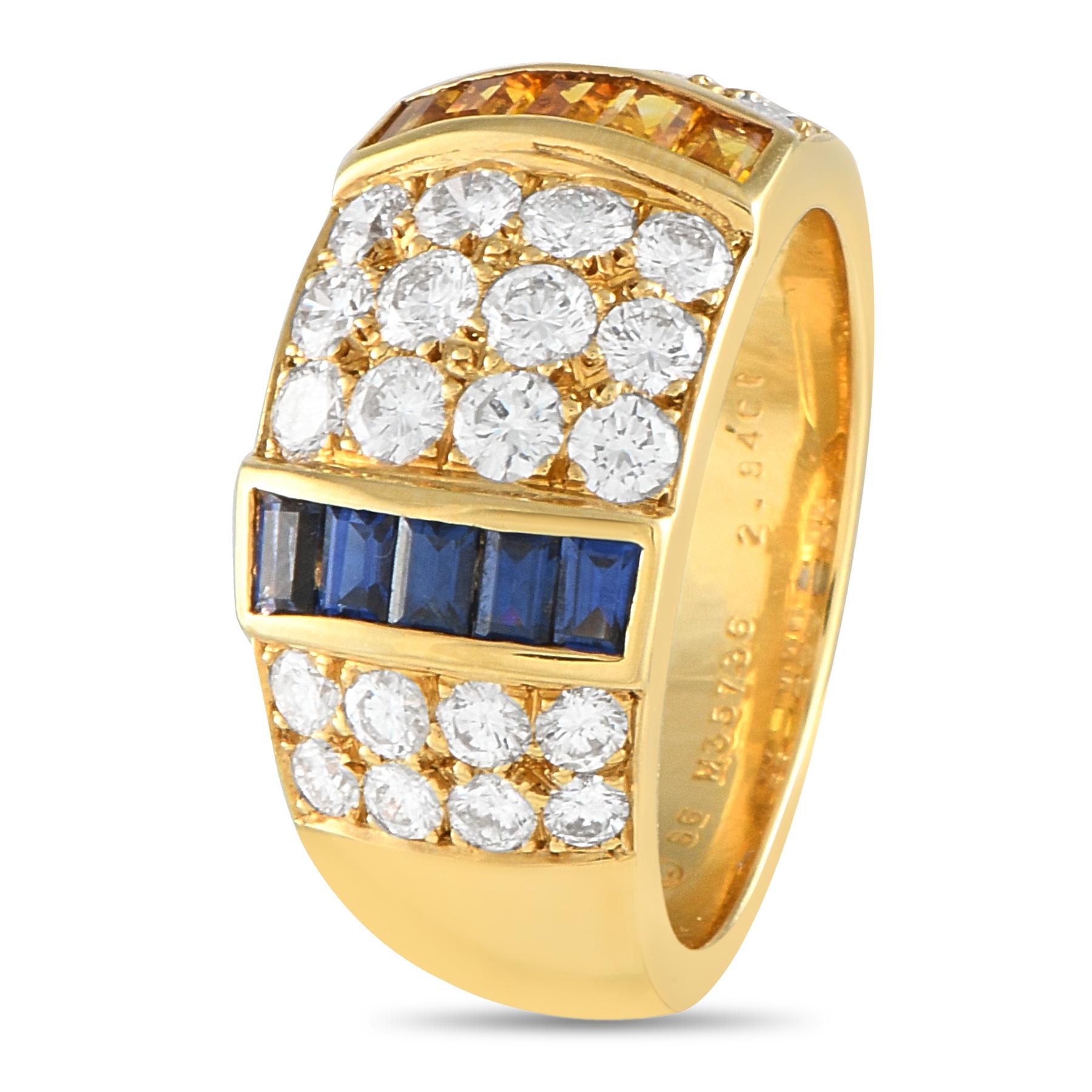 This Van Cleef & Arpels ring is sleek, stylish, and incredibly sophisticated. Crafted from 18K Yellow Gold, Diamonds with a total weight of 1.45 carats elevate the simple setting. Blue and yellow Sapphire gemstones with a total weight of 1.39 carats