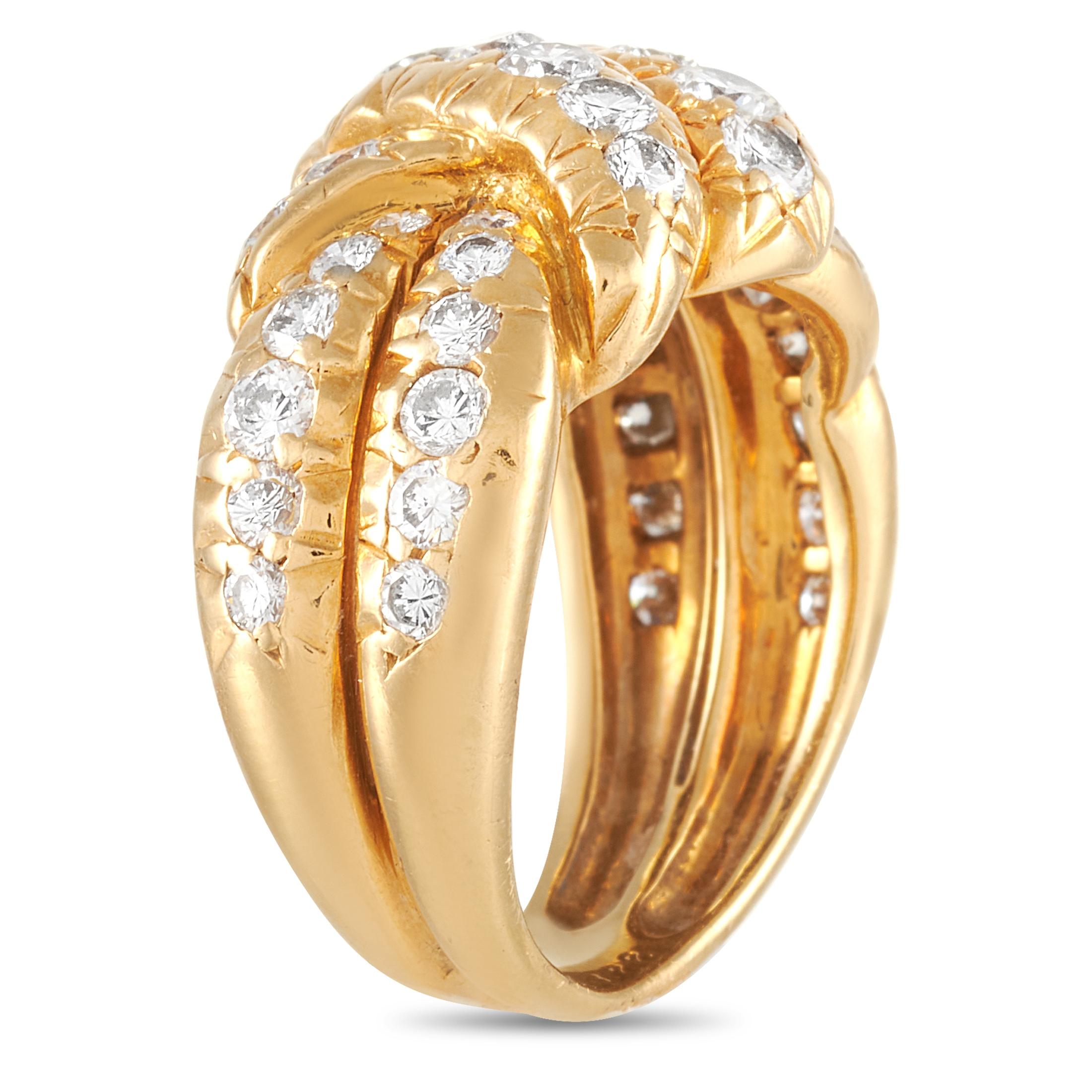 This Van Cleef & Arpels 18K Yellow Gold 1.75 ct Diamond Ring is a statement piece made with braided 18K yellow gold and set with 1.75 carats of round diamonds. The ring has a band thickness of 7 mm, a top height of 5 mm, and top dimensions of 13 by