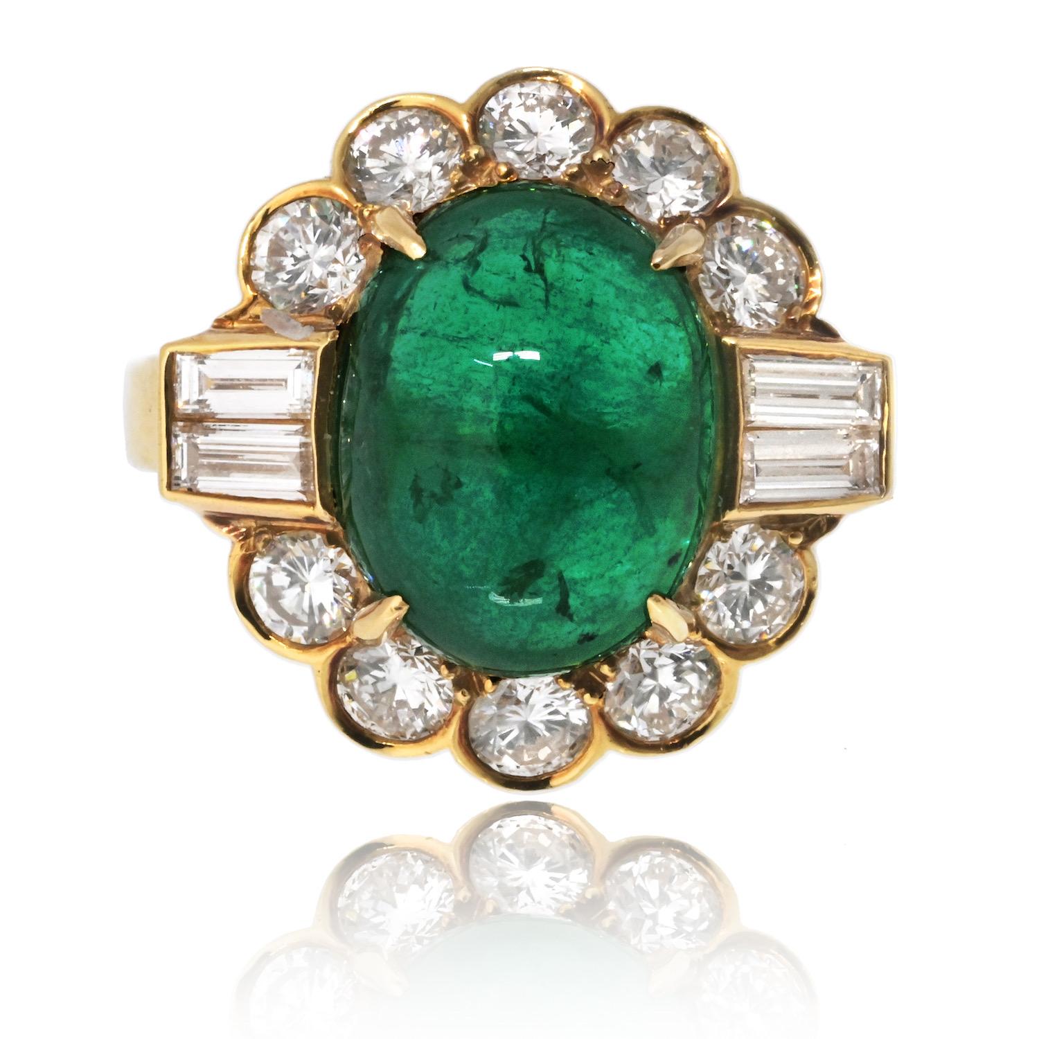 Indulge in the timeless elegance of this Vintage Van Cleef & Arpels Emerald and Diamond Ring, a stunning piece that exudes luxury and sophistication. This exquisite ring features a beautifully alpine green cabochon cut emerald at its center,