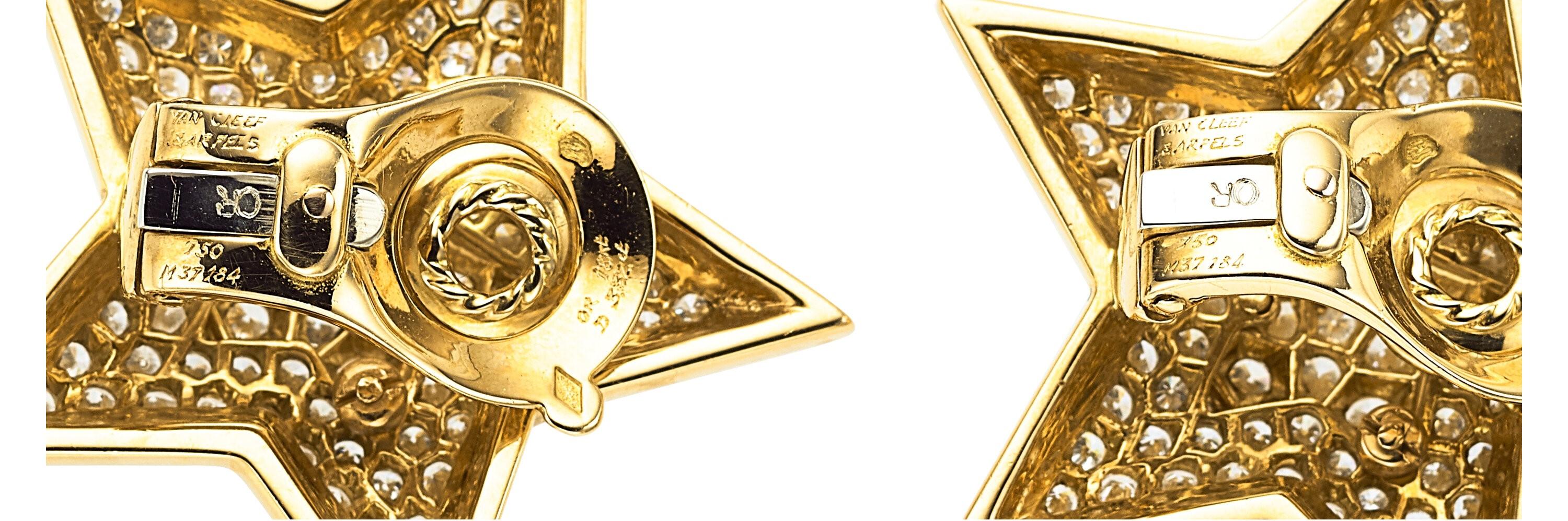 The star earrings feature full-cut diamonds weighing a total of 3.32 carats
Set in 18k gold, marked Van Cleef & Arpels, M37184, French hallmarks. 
Gross weight: 22.50 grams.
Dimensions: 1-1/4 inches x 1-1/4 inches
*Note: earrings are designed for