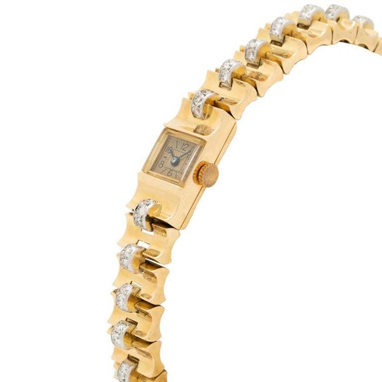 Van Cleef & Arpels 18k Yellow Gold and 3.0cts Diamond Timepiece C.1940s

Additional Information:
Maker: Van Cleef & Arpels
Year: c.1940s
Material: 18k Yellow Gold, 3.0cts.Diamonds
Dial: 11mm Square Case
Movement: Manual
Weight: 48.94g
Length 7