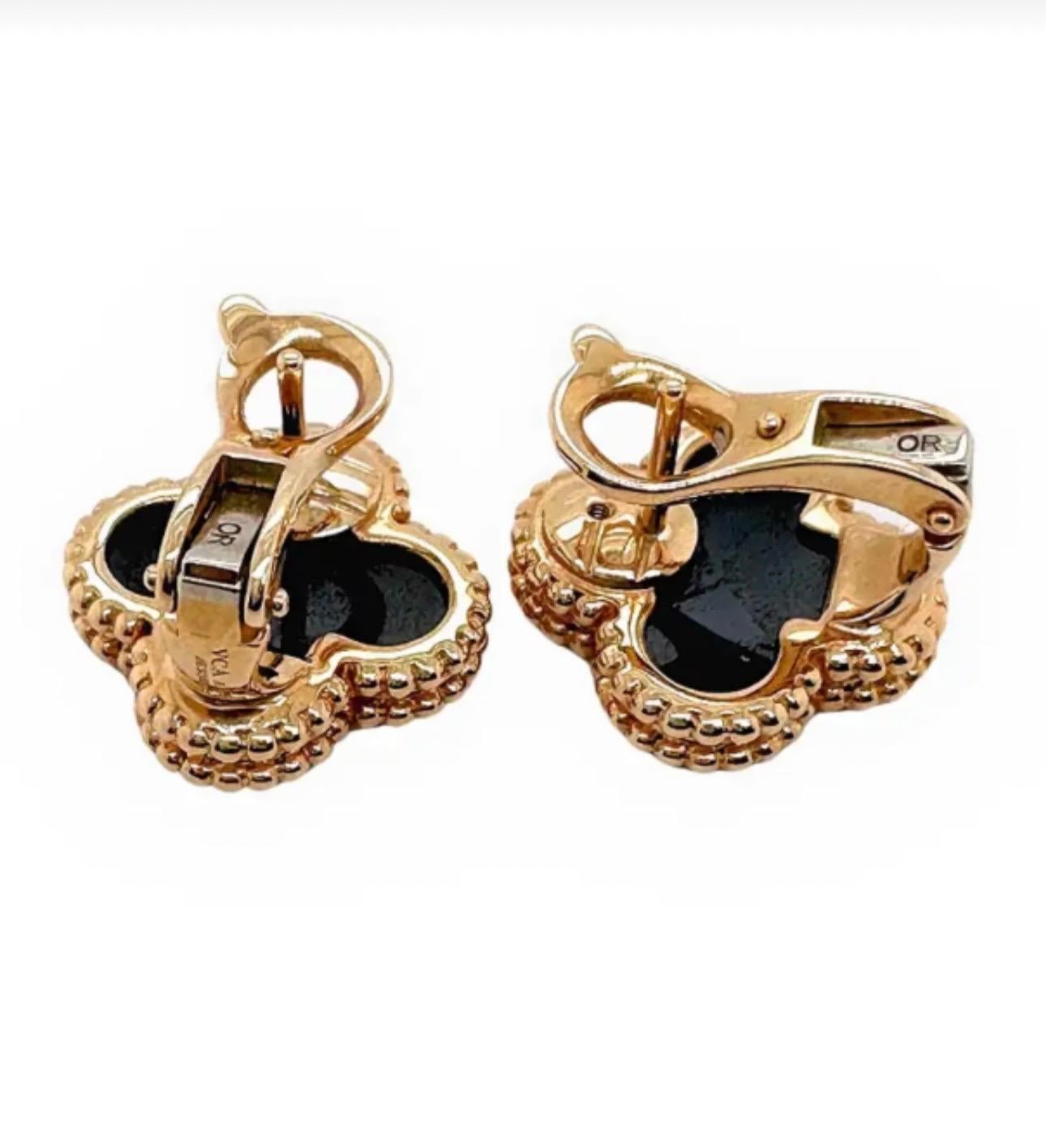 This classic Van Cleef & Arpels Earring from the iconic Vintage Alhambra collection is crafted in 18k yellow gold and features 1 lucky clover motifs earring beautifully inlaid with black onyx in round bead settings. Made in France circa 2012. 
This