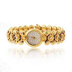 Van Cleef & Arpels Montre Bouton D'or modèle moyen avec cadran en diamants en or jaune 18 carats