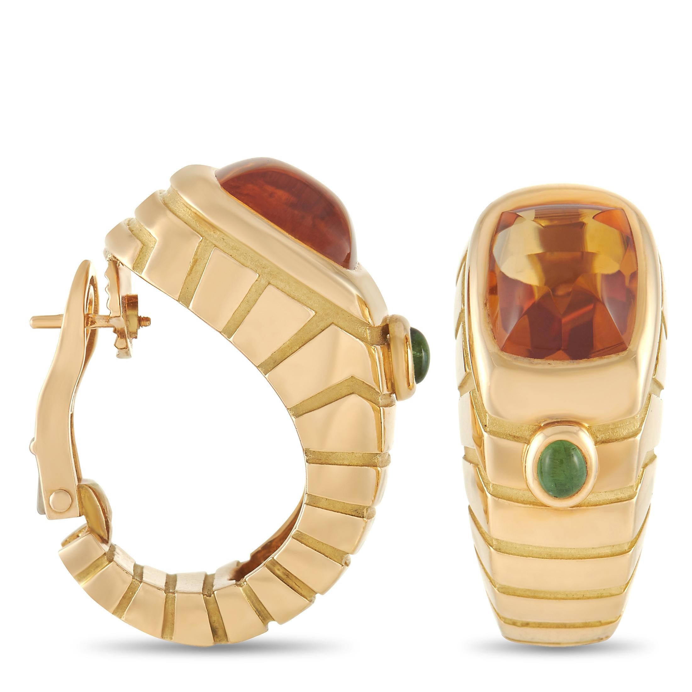These Van Cleef & Arpels earrings command attention for all the right reasons. A striking 18K Yellow Gold setting provides the perfect foundation for an array of opulent colored gemstones, including a large Citrine gemstone and a smaller green