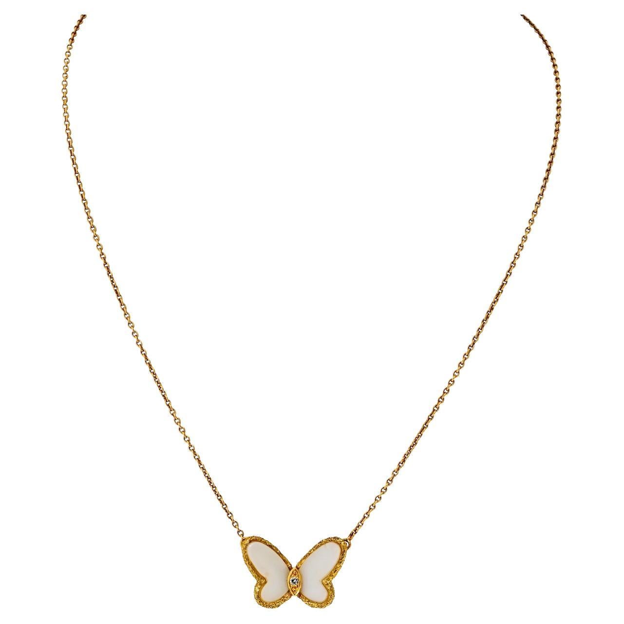 Van Cleef & Arpels Collier papillon vintage en or jaune 18K et corail