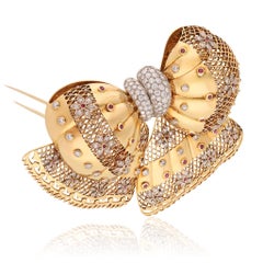 VAN CLEEF & ARPELS 18K Yellow Gold, Diamond and Ruby Bow Brooch