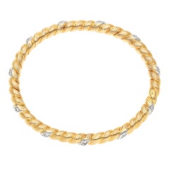 Bracelet rigide Van Cleef & Arpels en or jaune 18 carats serti de diamants