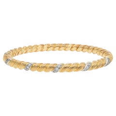 Bracelet rigide Van Cleef & Arpels en or jaune 18 carats serti de diamants