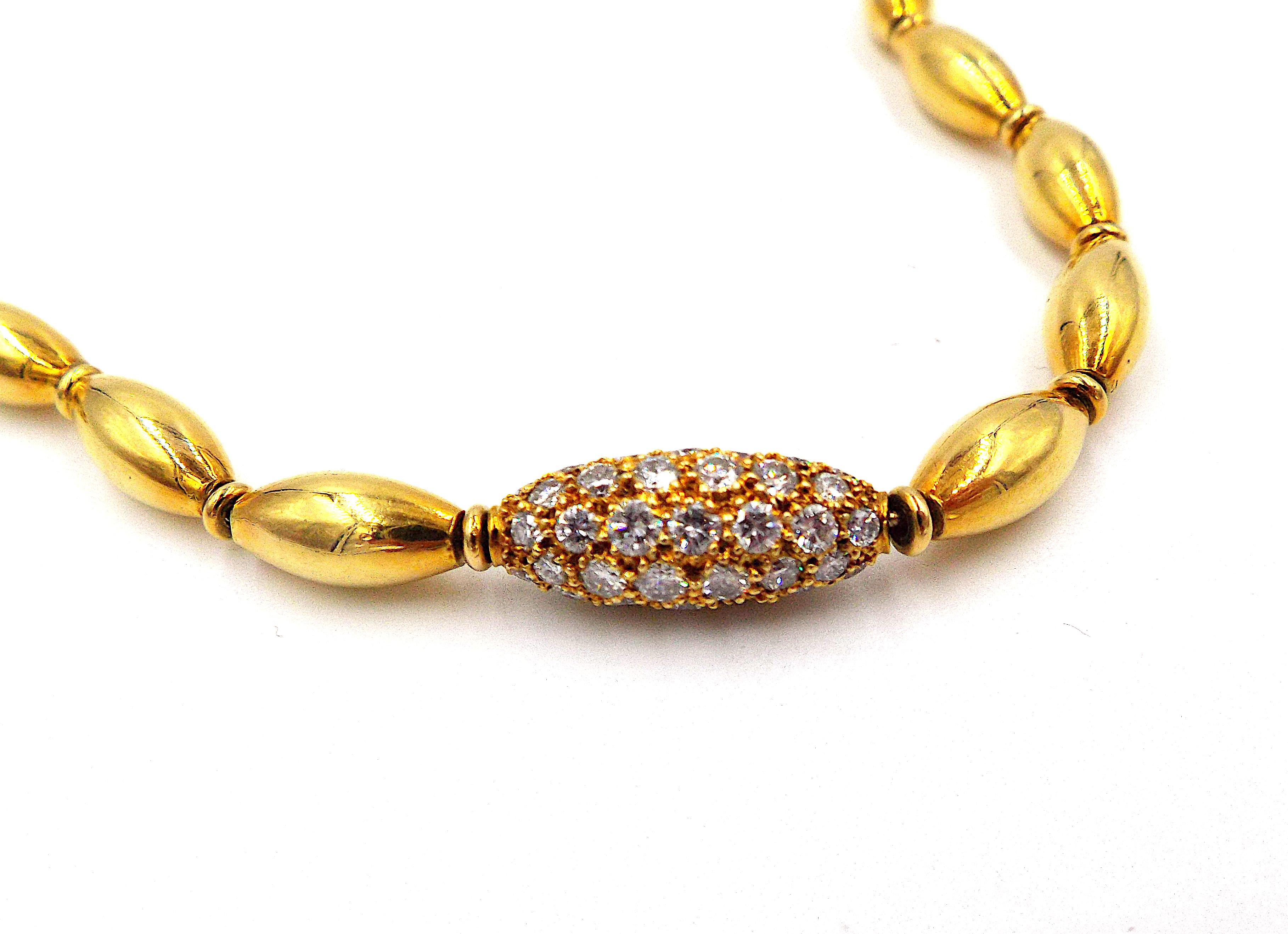 An elegant bead necklace by Van Cleef & Arpels. 18K yellow gold, approx. 4.95ct E-G/VS diamonds, lengths is ap. 19.5'', signed VCA, numbered.