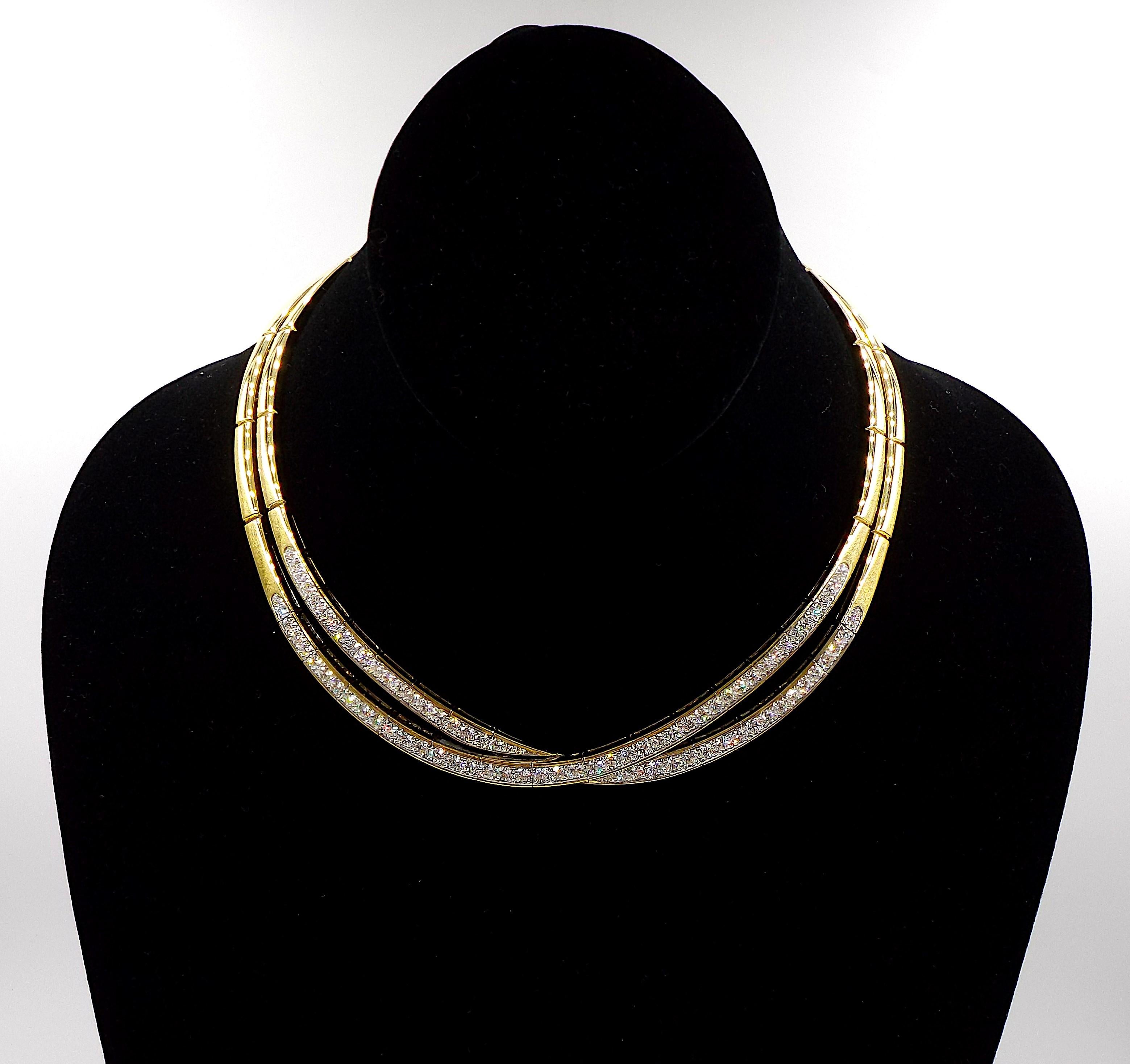 An elegant gold and diamond necklace by VCA. Featuring ap. 9ct of diamonds, F color and VVS clarity. Gross weight is 82.8 grams, inner circumference is ap. 15 inches. Signed, numbered, stamped 750. Comes with a large vintage VCA box.