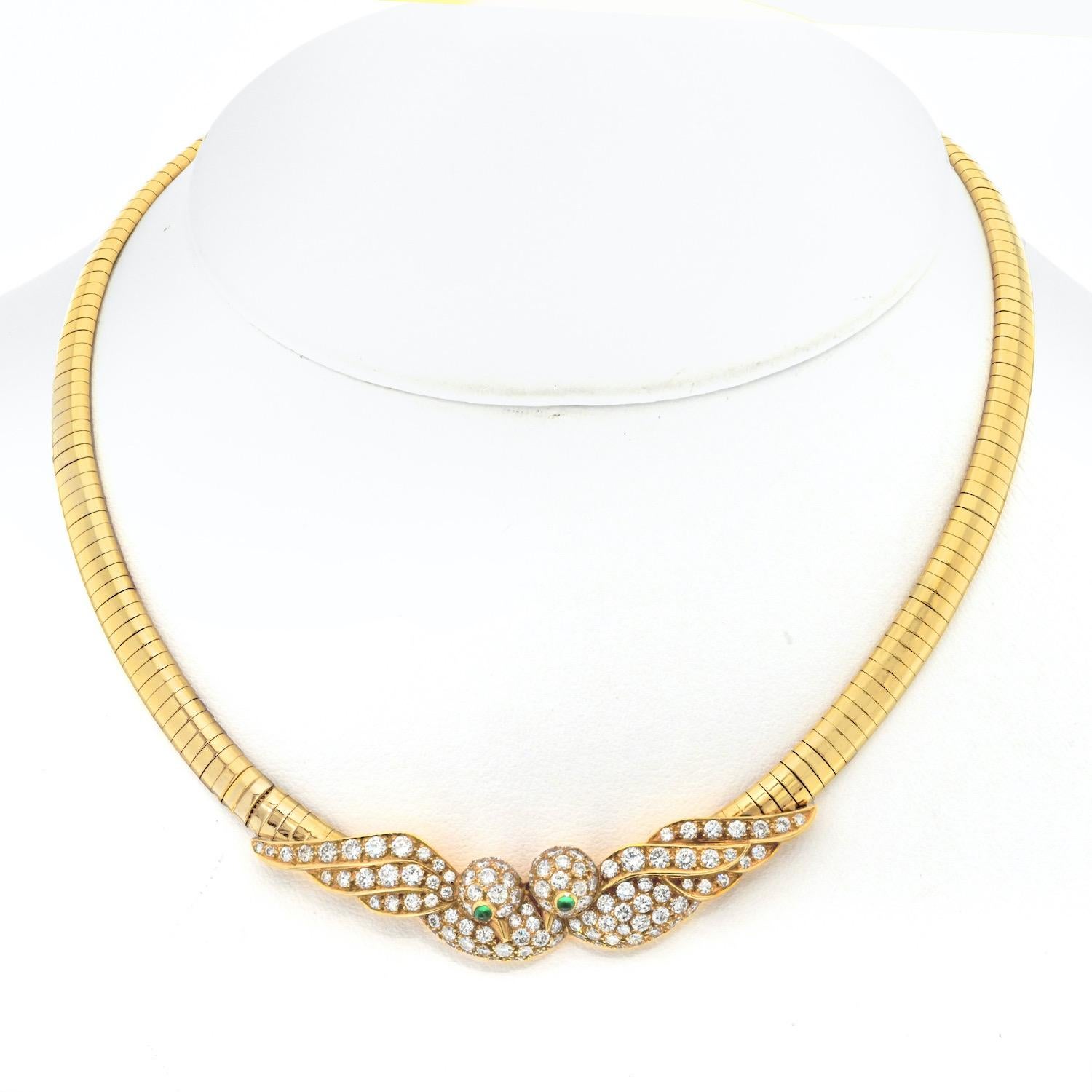 Adorn yourself with the enchanting elegance of the Van Cleef & Arpels 18K Yellow Gold Lovebirds Necklace, a rare vintage piece from the 1980s that captures the essence of timeless romance and luxury. This exquisite necklace features two intricately