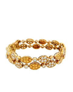 Van Cleef & Arpels - Bracciale a doppio anello ovale in oro giallo 18 carati con diamante