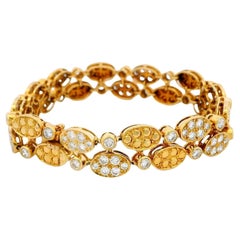Van Cleef & Arpels 18 Karat Gelbgold Doppel-Ovales Gliederarmband mit Diamanten