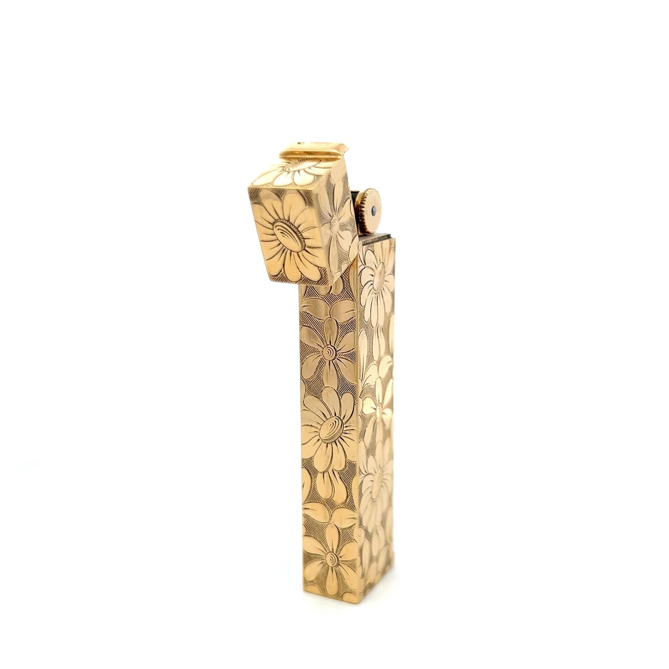 Designer:
Van Cleef 
Arpels
Title:
This rare vintage Van Cleef 
Arpels cigarette lighter is crafted entirely in luxurious 18K yellow gold and decorated with an intricate floral engraving that wraps elegantly around every surface. The