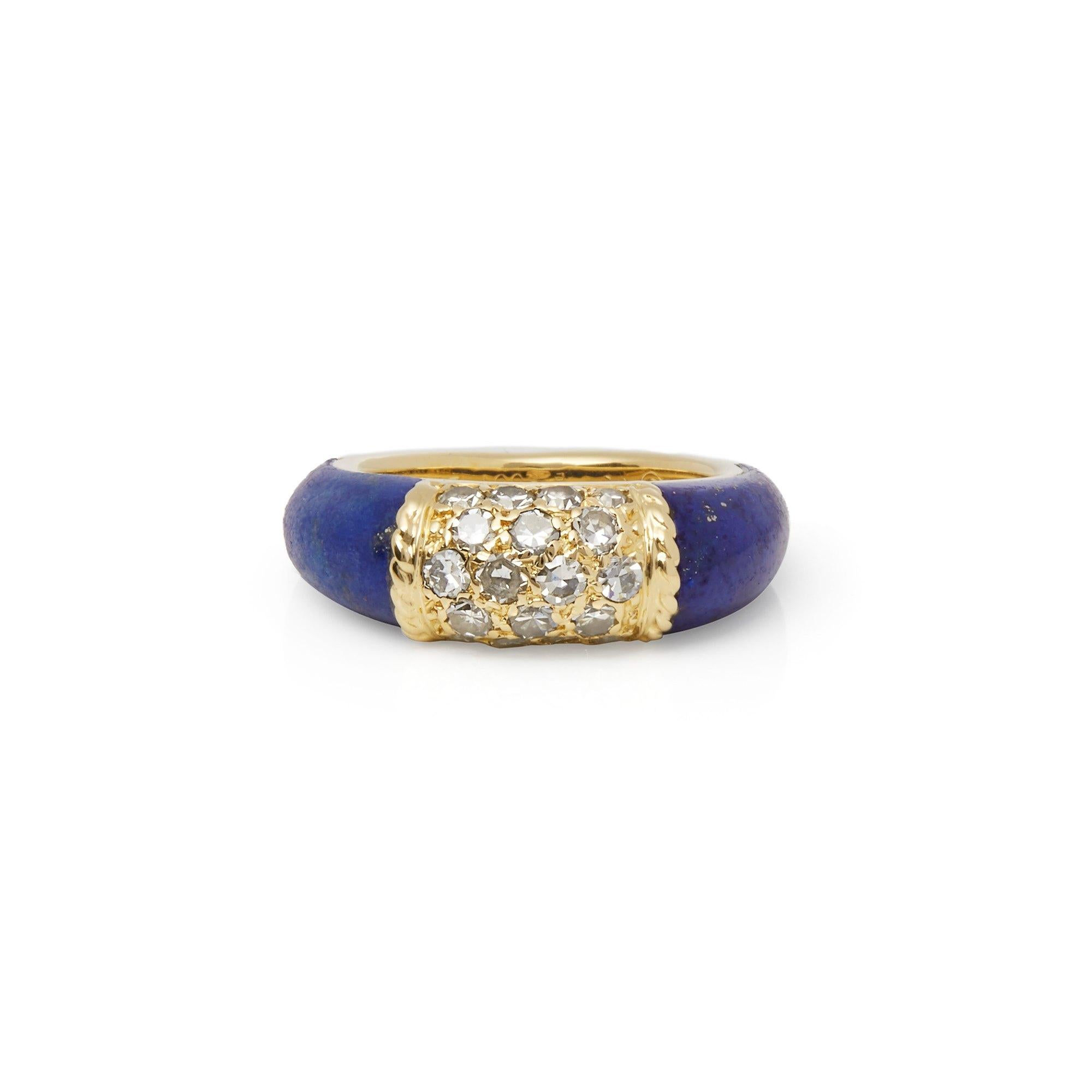 This Vintage Ring by Van Cleef and Arpels is from their Philippine Collection and features a Lapis Lazuli Carved Band with 18k Yellow Gold Pave Diamond section set with 18 Round Brilliant Cut Diamonds Totalling 0.90cts to the top. Ring Size UK I, EU