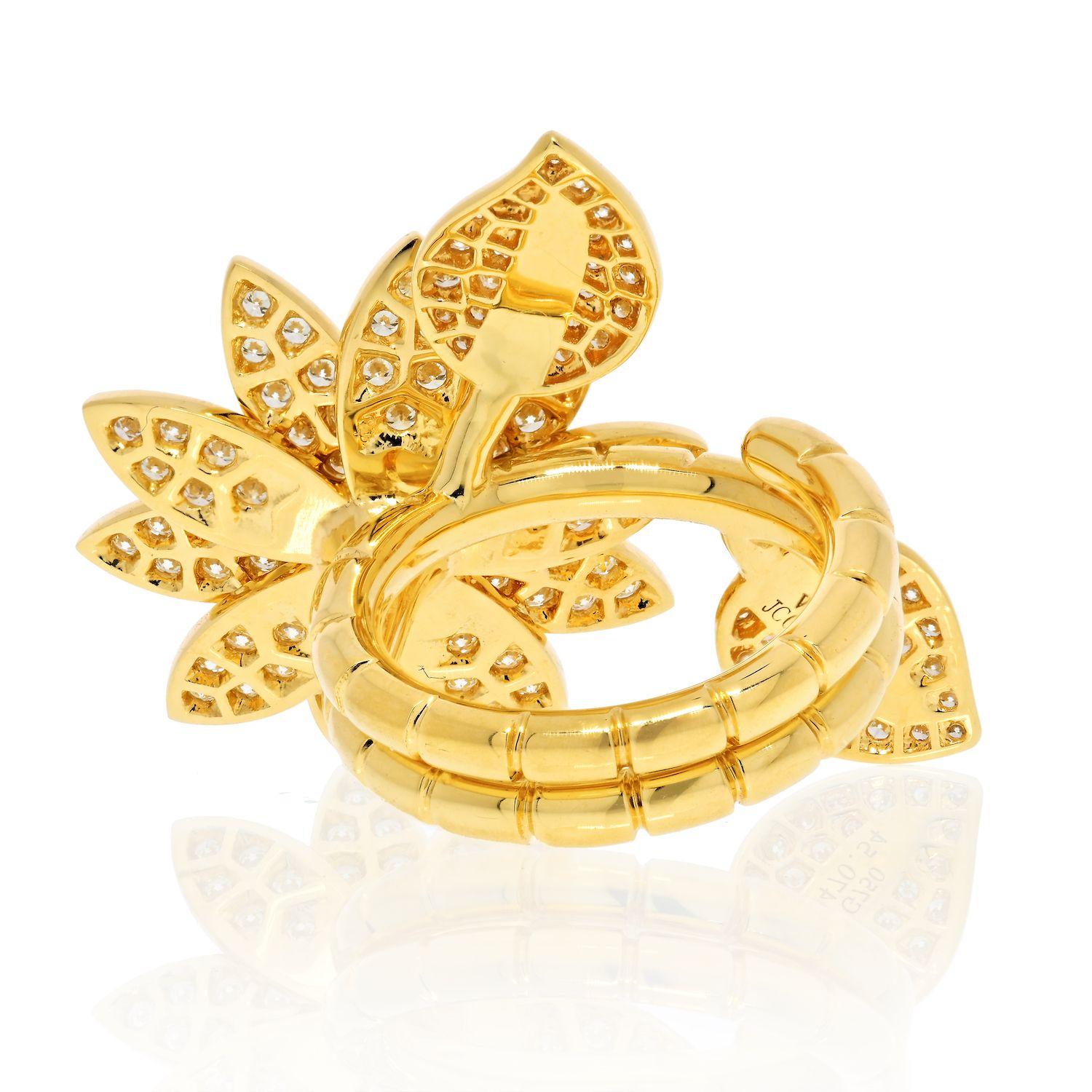 Authentic Van Cleef & Arpels The Lotus Between the Finger Ring, size 7, EU 54, ring has been polished and cleaned, comes with VCA ring box.
The Lotus ring set in yellow gold and diamonds is one of the Maison's emblematic pieces. This exceptional