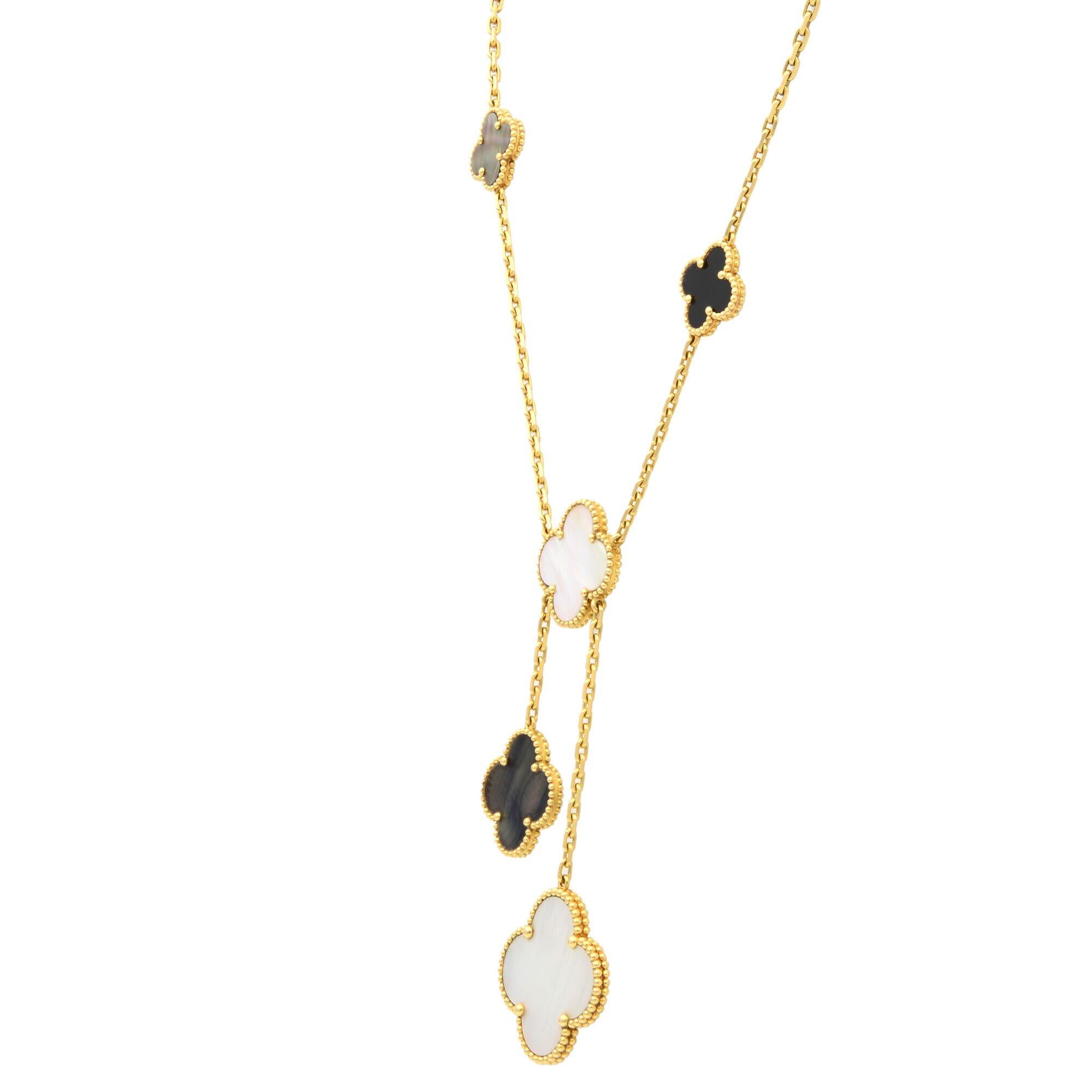 Magic Alhambra necklace by Van Cleef & Arpels. Multi-size mixed drops. Black onyx with white and gray mother-of-pearl.
Created in 2006 by Van Cleef & Arpels, the Magic Alhambra jewelry creations gather different-sized Alhambra motifs, coming